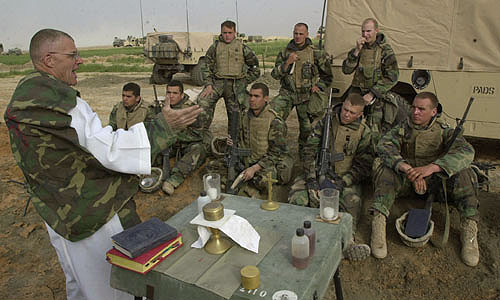 Marines at Catholic service in Iraq><BR CLEAR=